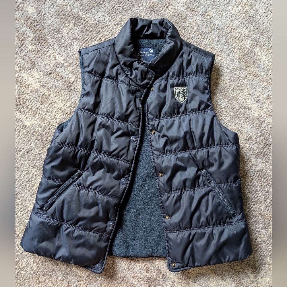Black Puffer Vest with Crest Logo